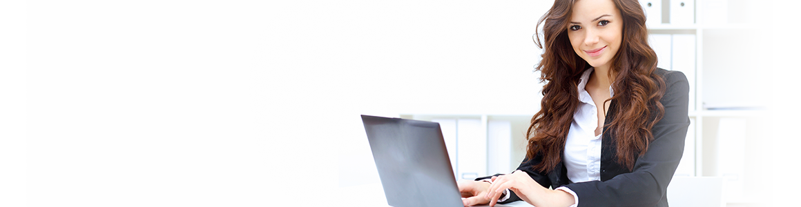 woman typing on a laptop